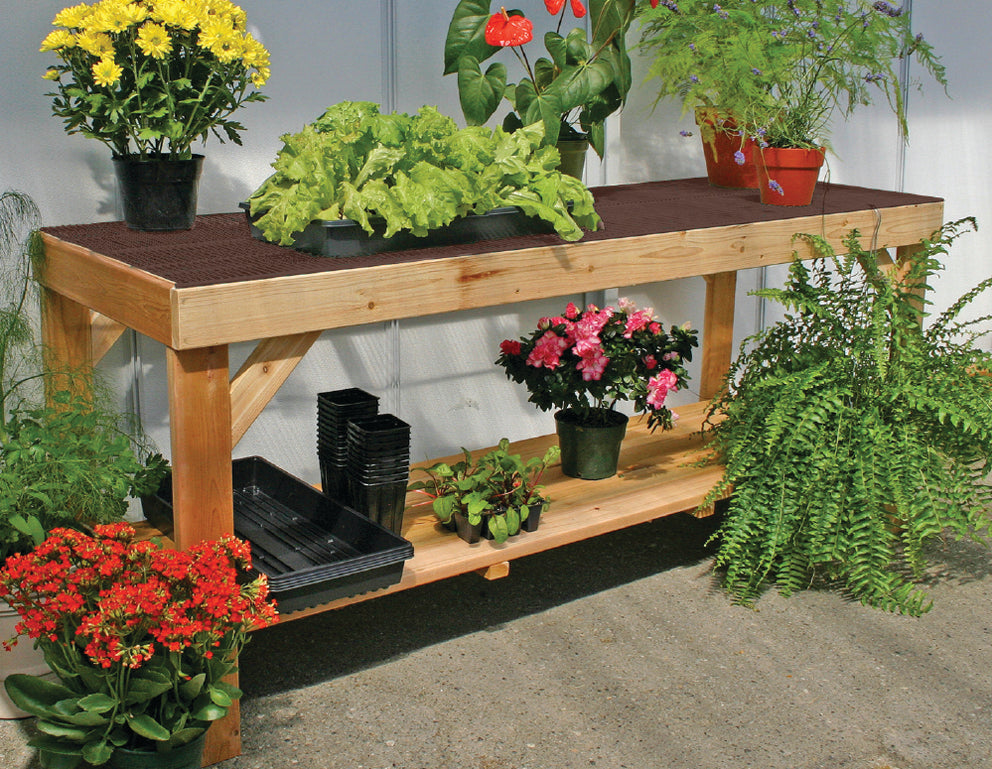 Charley’s Cedar Wire-Top Potting Bench Kit- with brown wires and plants on top 